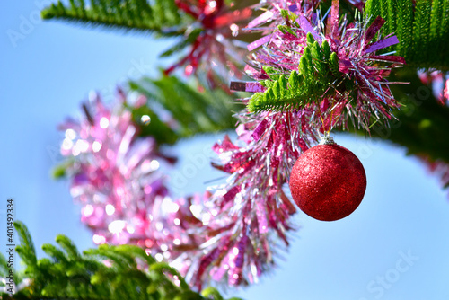 Close up of  balls on christmas tree. Holiday background. Merry Christmas and Happy New Year Concept.