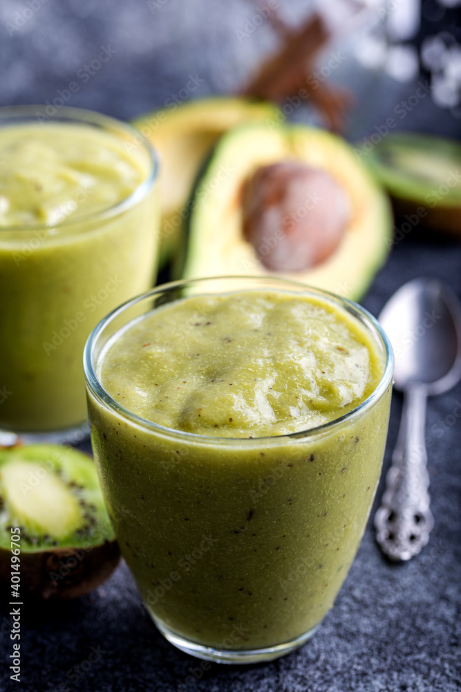 Green smoothie kiwi banana and avocado. Fresh juicy green detox smoothie. Green smoothie kiwi banana and avocado. Fresh juicy green detox smoothie.