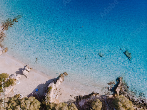 Tropical beach of Voulisma beach, Istron, Crete, Greece ,Most beautiful beaches of Crete island -Istron bay near Agios Nikolaos drone aerial view photo