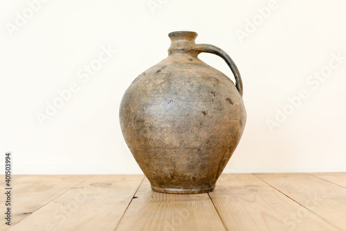 old jug on white background