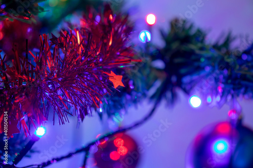 Christmas tree decorations with blurred background. Festive season. Indoors