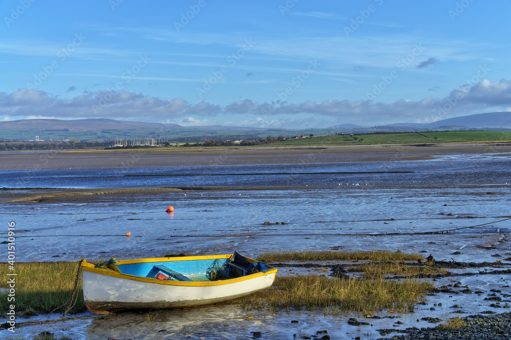 Fototapeta premium A small rowing boat on the shore at Sunderland Point