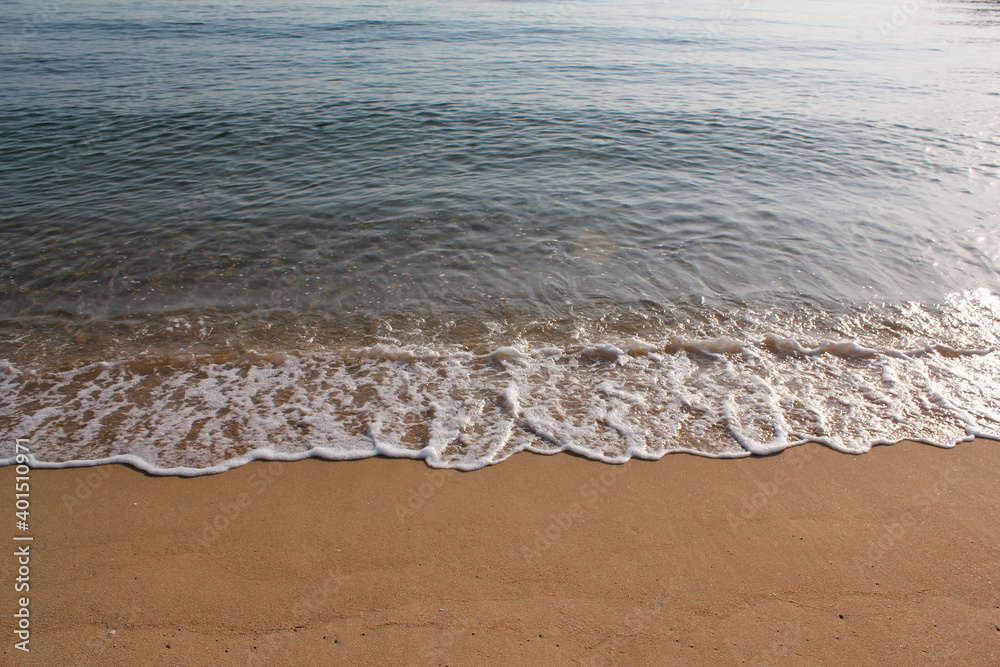 Soft beautiful ocean wave on sandy beach. Background Soft beautiful ocean wave on sandy beach. Background