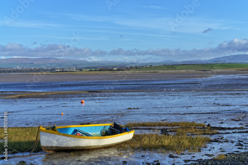 A small rowing boat on the shore at Sunderland Point