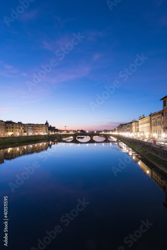 It is the scenery near the Arno river in Florence, Italy. At dusk, the sky is clear and sunny, which is very fantastic. © Tom Spark