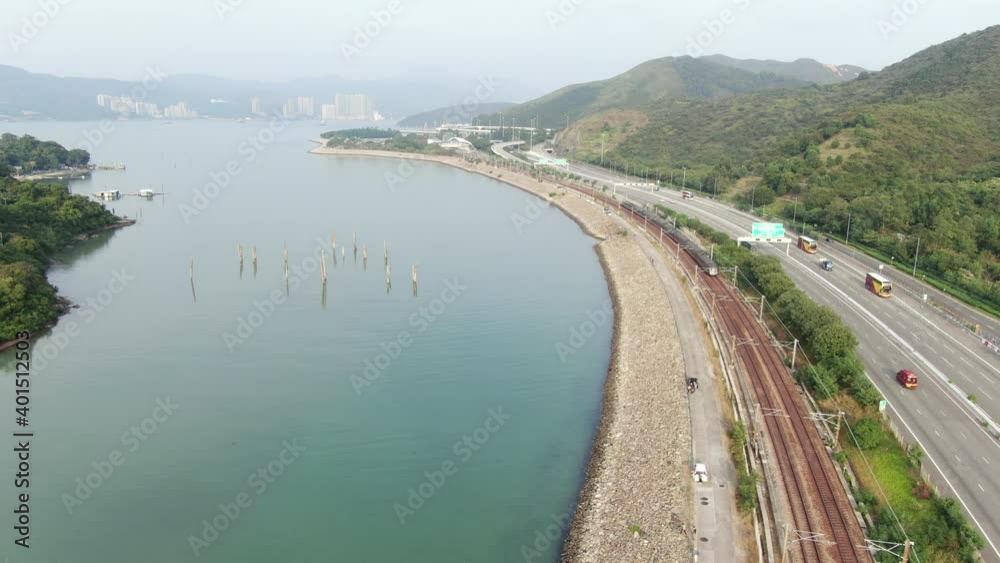Hong Kong hidden bay in Lantau island with old Tree trunks sticking out of the water, Aerial view Hong Kong hidden bay in Lantau island with old Tree trunks sticking out of the water, Aerial view