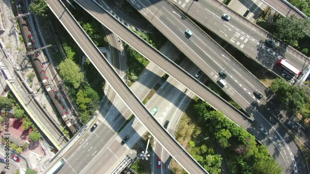Massive Highway interchange with traffic on all levels in downtown Hong Kong, Aerial view. Massive Highway interchange with traffic on all levels in downtown Hong Kong, Aerial view.