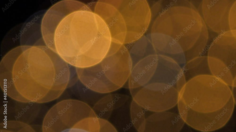 Christmas lights in the form of a blurred circle. Blurred background. Flashing abstract Christmas lights. Christmas lights video. Christmas lights in the form of a blurred circle. Blurred background. Flashing abstract Christmas lights. Christmas lights video.