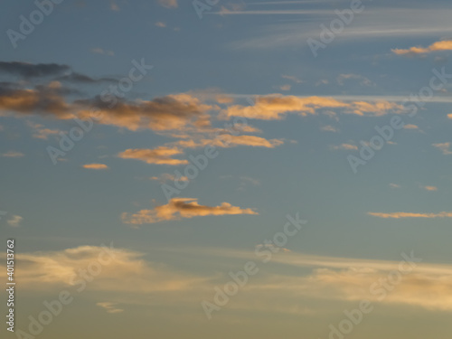 photo of the sky with a beautiful sunrise and golden clouds