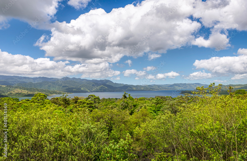 Obraz premium Amazing view of beautiful nature of Costa Rica with lake and forest near volcano Arenal in summer. La Fortuna, Costa Rica. Central America.