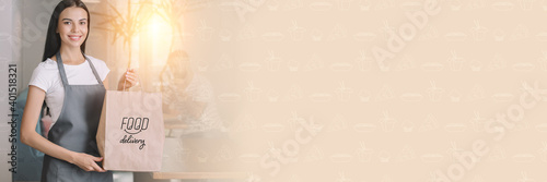 Young waitress with food fo...
