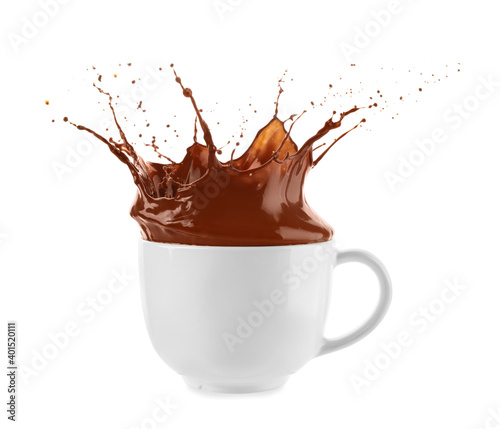 Cup with splash of hot chocolate on white background