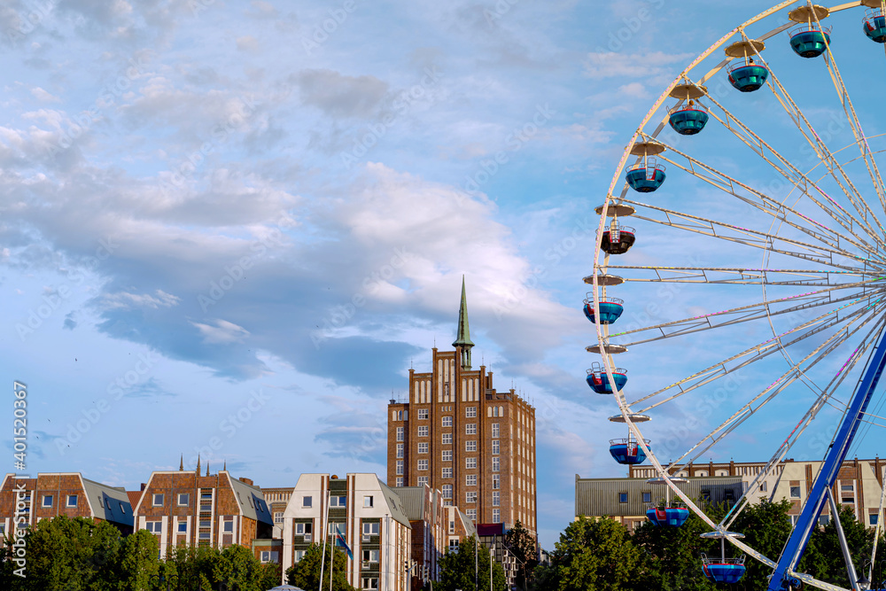 Evening view of Rostock skyline from Warnow river, Germany Evening view of Rostock skyline from Warnow river, Germany