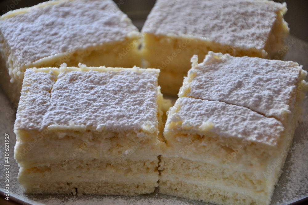 Piece of white cake slice close up homemade