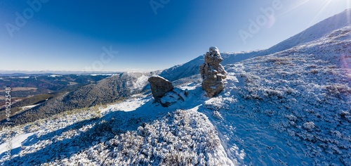 Landscapes of the Carpathian Mountains, covered with large stone ledges in Ukraine, near the village of Dzembronya photo