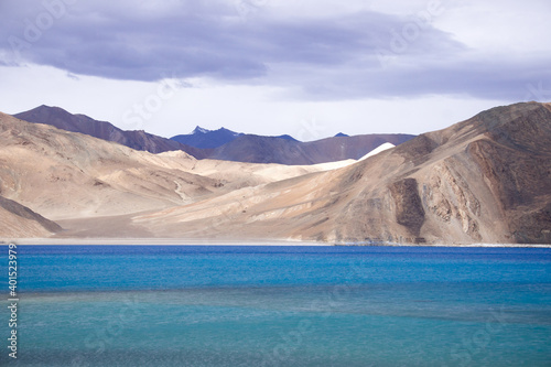 Alpine lake Bangong Tso, India-China border, snowy peaks, alpine villages, Ladakh, Himalayas, India