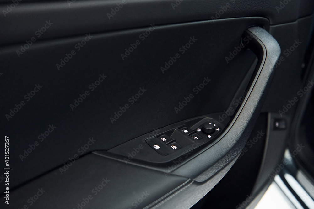 Car's window. Close up focused view of brand new modern black automobile Car's window. Close up focused view of brand new modern black automobile