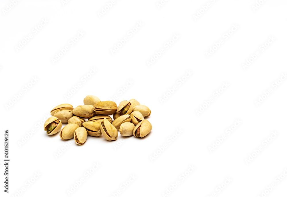 Pistachio nuts on a white background Pistachio nuts on a white background