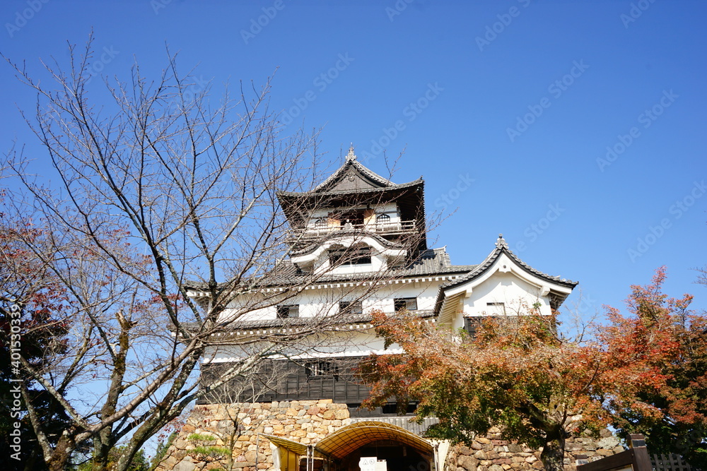 Inuyama Castle with red and yellow foliage in Inuyama City of Aichi, Japan - 愛知 犬山城 Inuyama Castle with red and yellow foliage in Inuyama City of Aichi, Japan - 愛知 犬山城