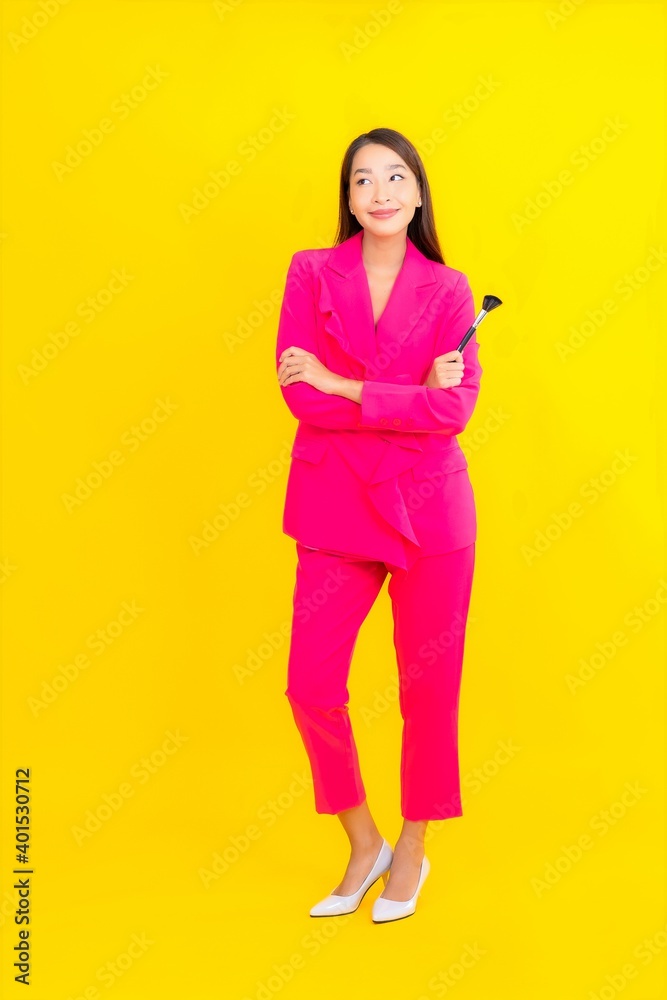 Portrait beautiful young asian woman with make up brush Portrait beautiful young asian woman with make up brush