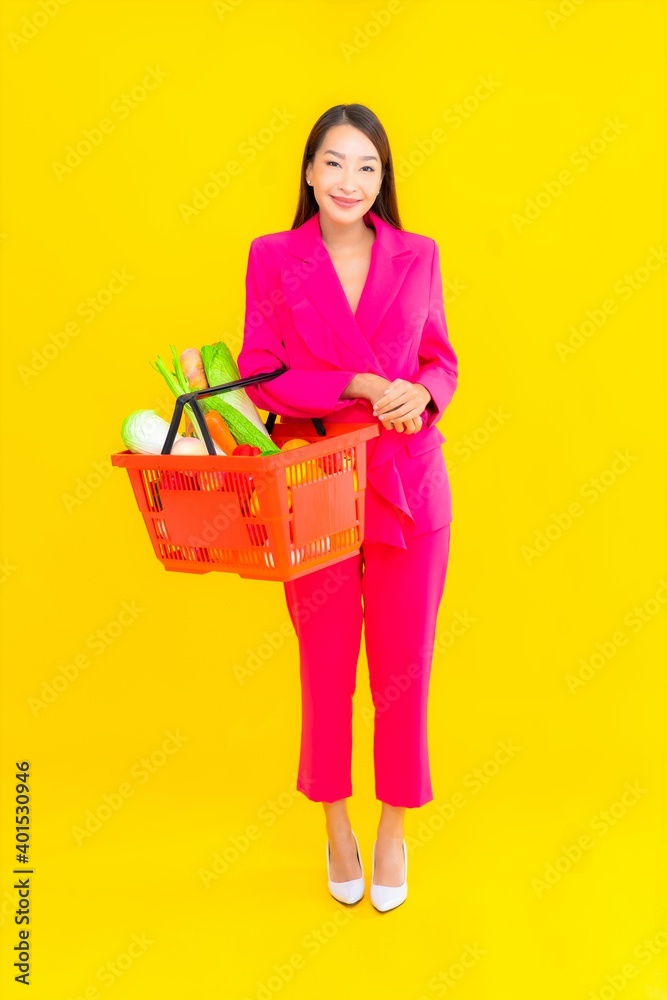 Portrait beautiful young asian woman with basket or cart and grocery Portrait beautiful young asian woman with basket or cart and grocery