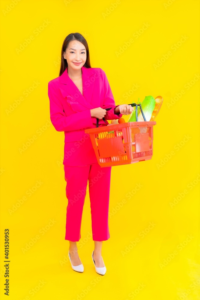 Portrait beautiful young asian woman with basket or cart and grocery Portrait beautiful young asian woman with basket or cart and grocery