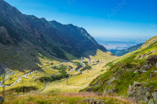 Panoramic view of mountain road Transfagarasan, the most beautiful road in Europe, Romania Transfagarash Ridge Fagaras. Scenic view at canyon in Carpathian mountains, Transylvania. Sunday traffic jam