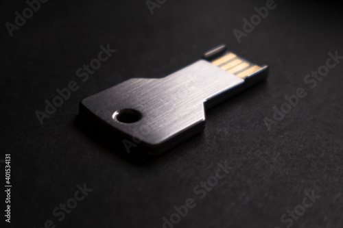 USB memory stick on a black background