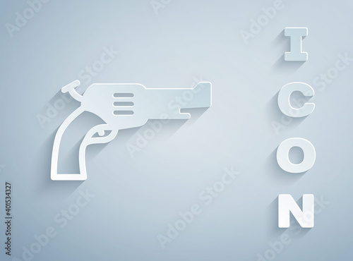 Paper cut Revolver gun icon isolated on grey background. Paper art style. Vector.