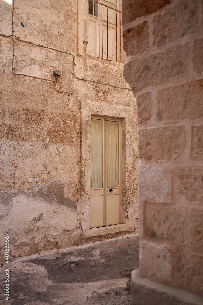 Monopoli, Italy - September 04, 2020 : View of a narrow street in the city center