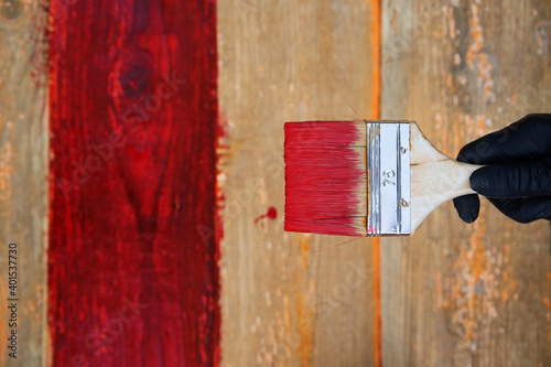 Obraz na płótnie Painting brush on the old wooden background. w salonie