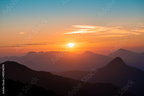Colorful sunset on top of brazilian mountain - Serra dos Orgaos National Park, Petropolis, Rio de Janeiro, Brazil