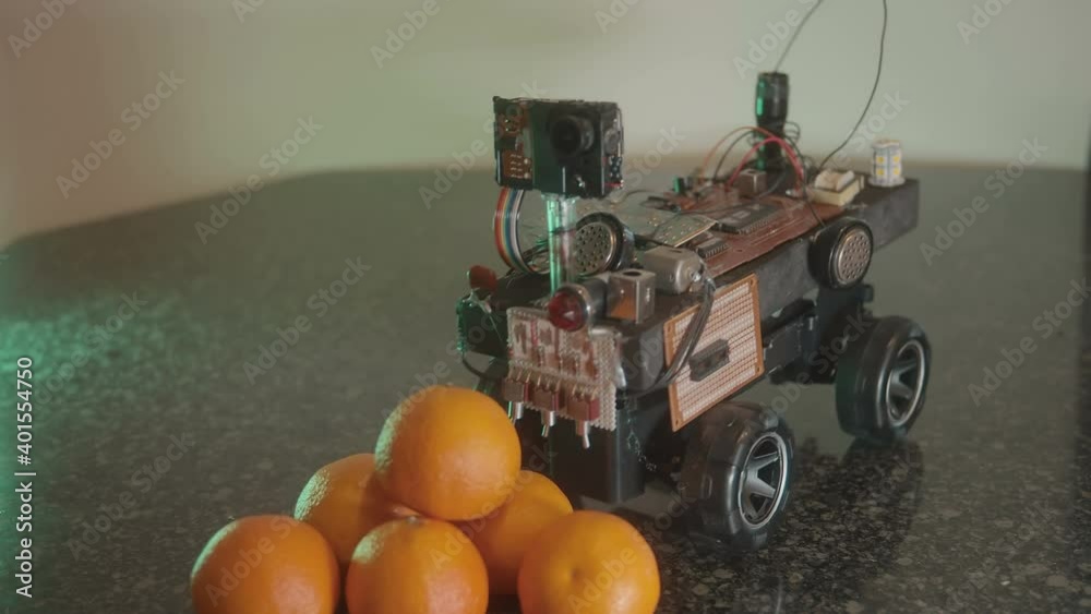 robot looking at fruit