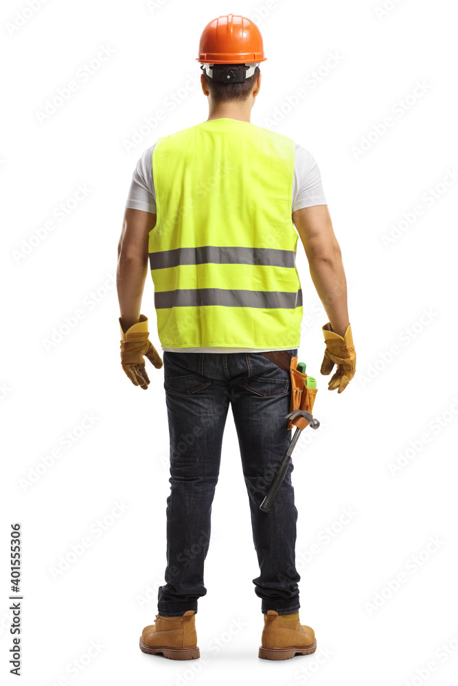 Full length back shot of a construction worker with a helmet and a vest Full length back shot of a construction worker with a helmet and a vest