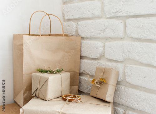 gift boxes from kraft envelope cost a lot on a white background