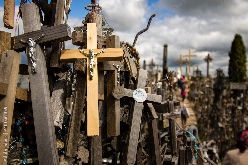 Hill of crosses, Kryziu kalnas in Lithuania, small crucifix with Jesus in detail