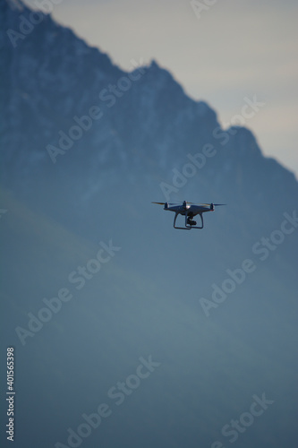 drone flying over the mountain, drone that films and takes pictures at height