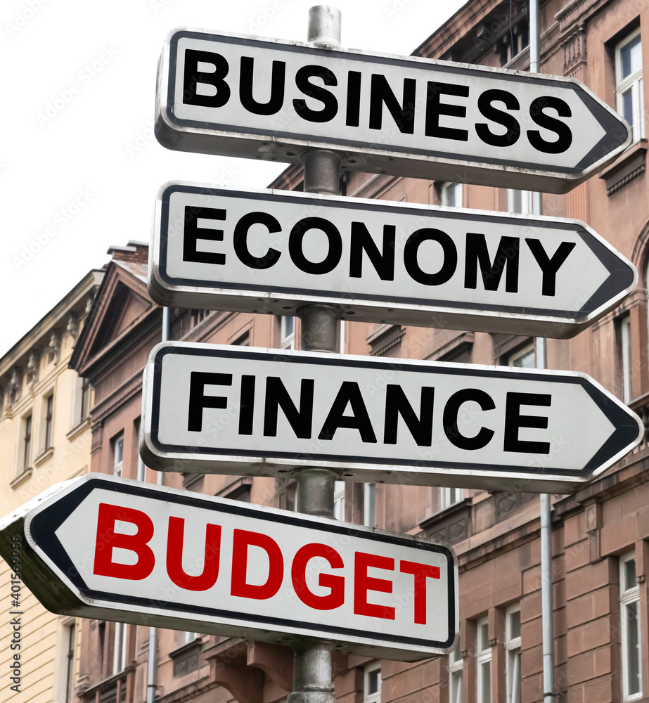 The road indicator on the arrows of which is written - business, economics, finance and BUDGET