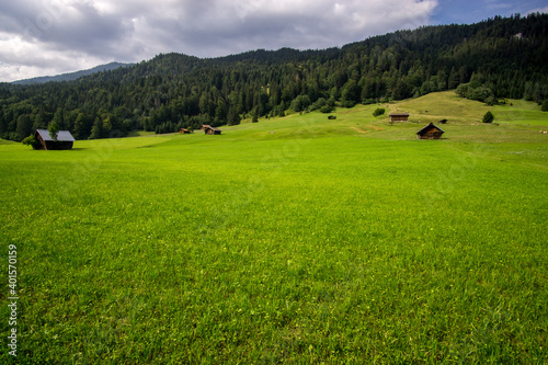 hut on meadows by Geroldsee lake, Bavarian Alps, Germany