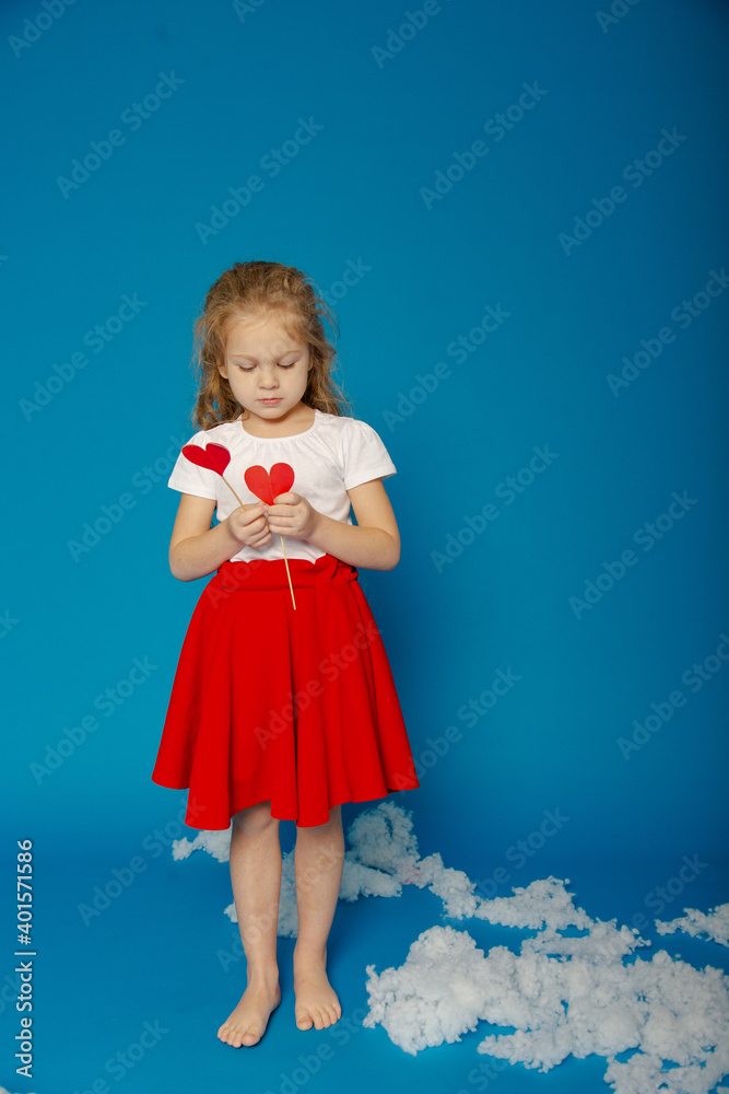 Little cute girl with fidget on Valentine's Day Little cute girl with fidget on Valentine's Day