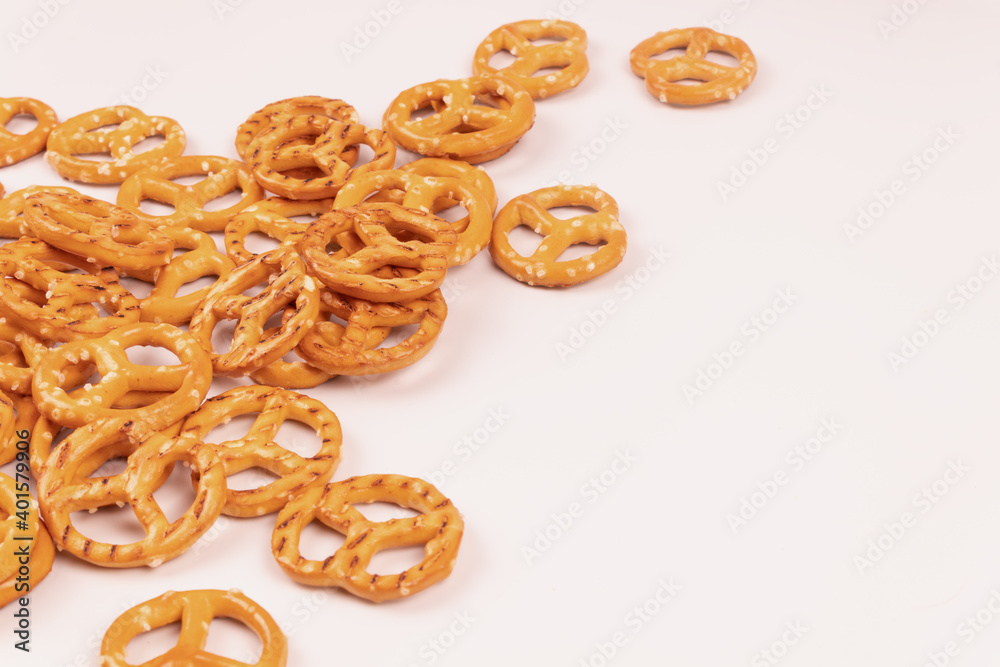A small amount of salted crackers sprinkled on the left side A small amount of salted crackers sprinkled on the left side