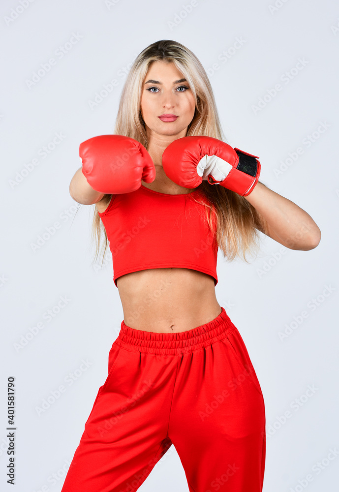 Self improvement. Sporty girl red clothes boxing gloves. Gym and workout. Fitness model. Sporty woman fitness trainer. Overcome problems. Personal training. Fight with own complex. Sporty lifestyle