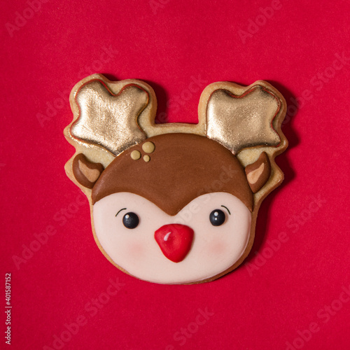 Flat lay composition with tasty homemade Christmas cookies on red background photo