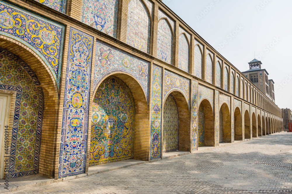 Vintage colorful mosaic ceramic tile wall on the Edifice of the Sun (Shams ol Emareh) of the royal Golestan Palace in Tehran, Iran, which is a UNESCO World Heritage site