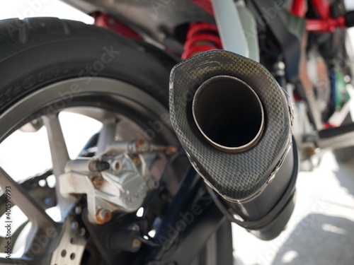 closeup of motorcycle exhaust system.