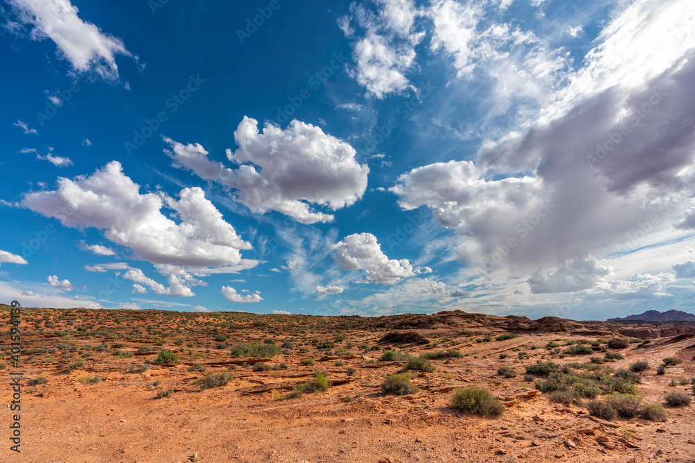Desert landscape and blue sky with puffy clouds, Arizona