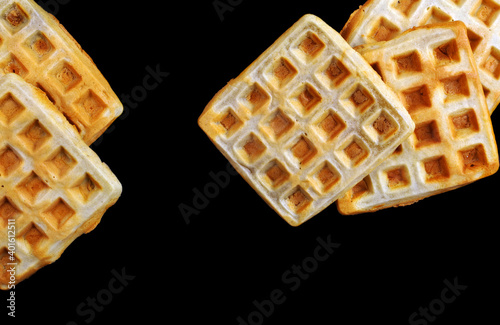 waffles isolated on black. top view