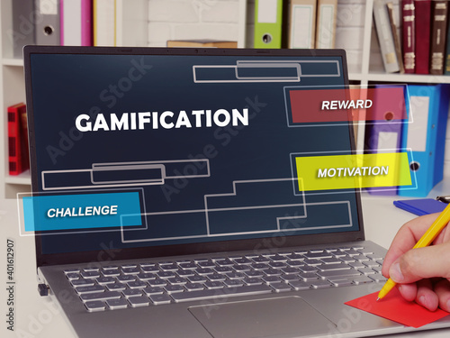Business concept meaning  gamification reward motivation challenge with inscription on the sheet.
