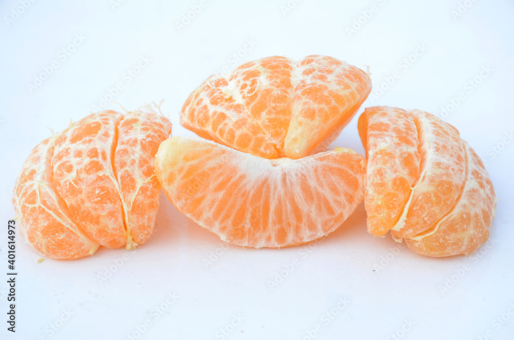 the ripe juicy peels orange isolated on white background. the ripe juicy peels orange isolated on white background.