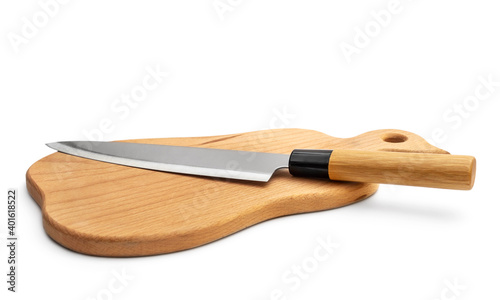 Kitchen knife on cutting board. Isolated on white.